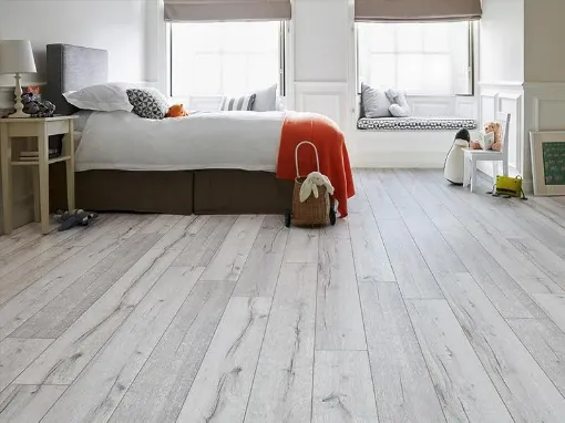 grey-laminate-bedroom-wood-floor-installation | ourfloorfitter.co.uk